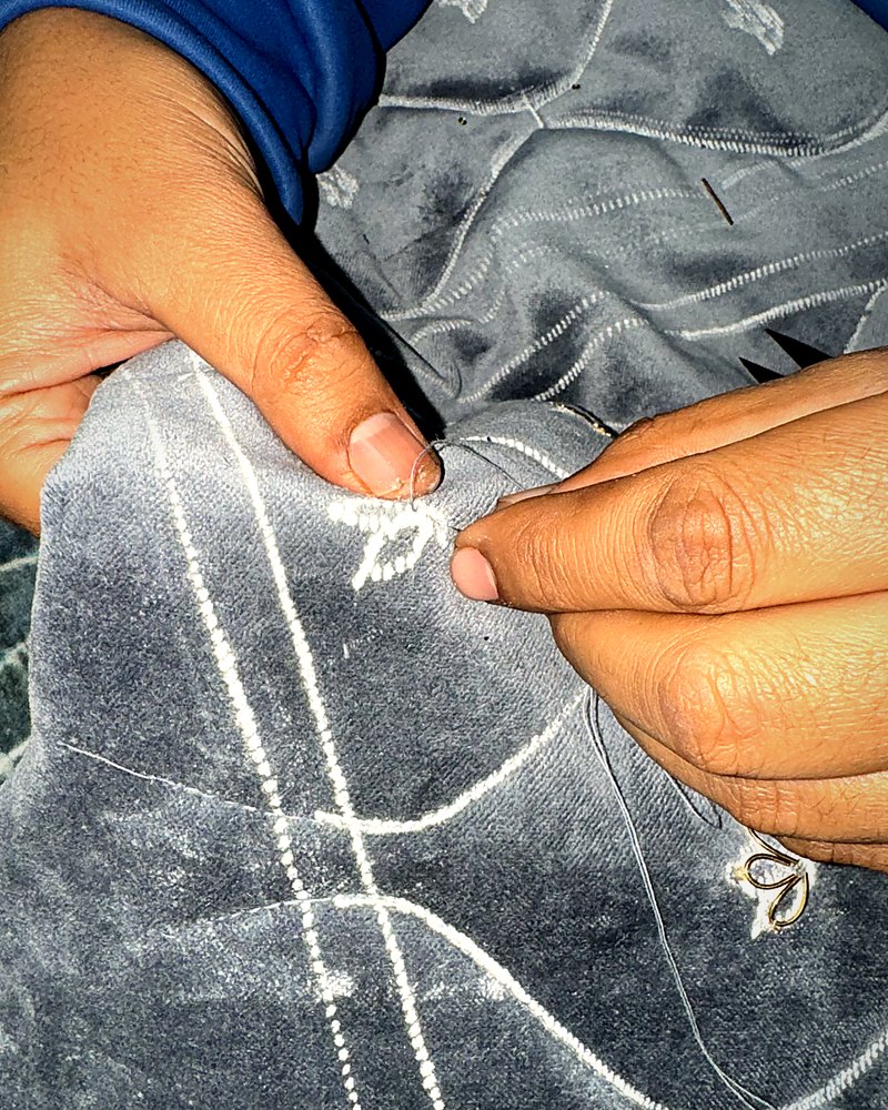 Hand-finishing detail on a panel